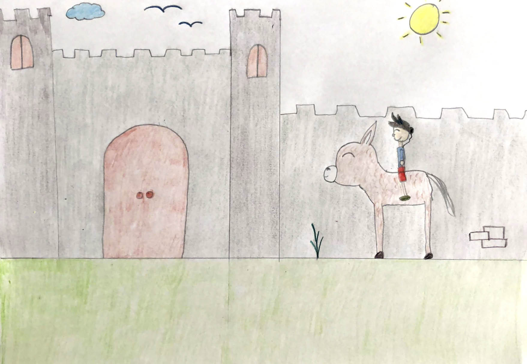 Dibujo infantil en el que se representa un paisaje, abarca el total de la hoja  Aparece un niño subido al burrito platero , los dos sonriendo, a través de un prado verde y al fondo han dibujado la puerta de acceso a un castillo  En el cielo aparece el sol, nubes y la silueta de dos pájaros volando